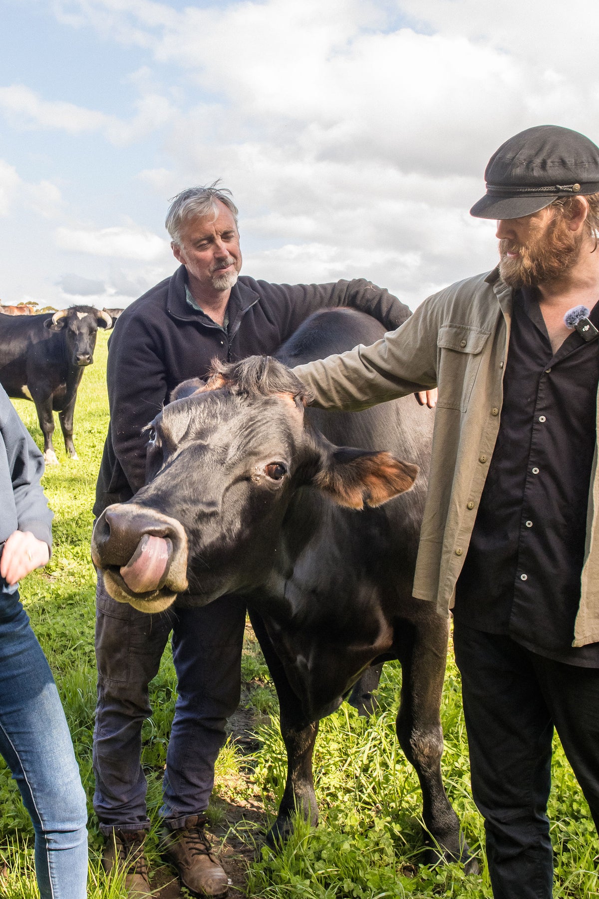 Chef Glen and a Lake Janis farmer with a Jersey cow