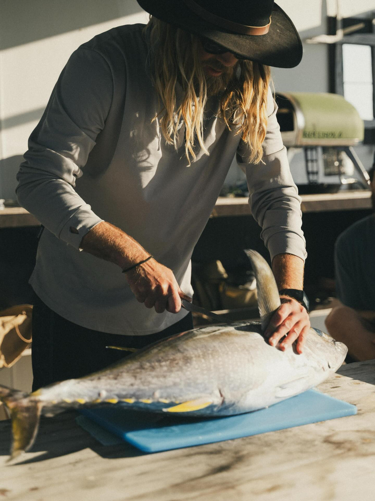 Chef Glen filleting a fish on the Shark Eyes island trip