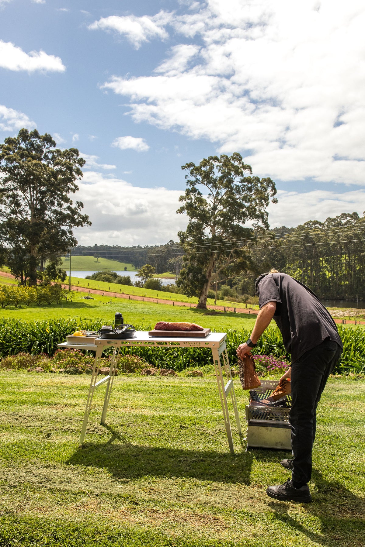 Chef Glen tending the Stratus Outdoors fire pit