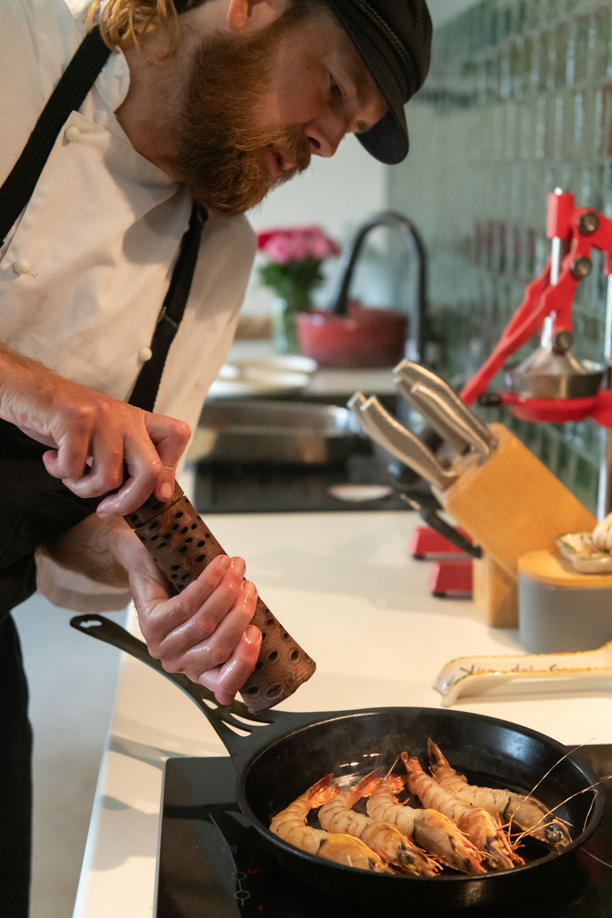 Chef Glen cooking prawns in a Solidteknics pan